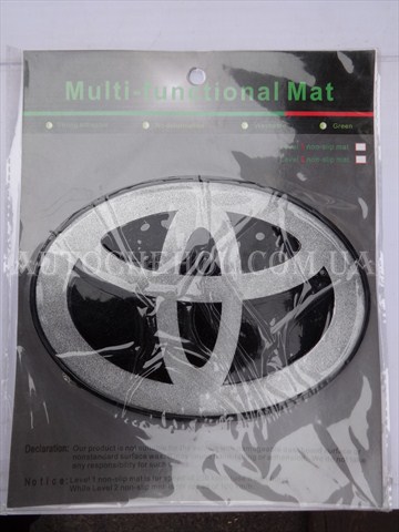 Овальный силиконовый фирменный коврик на торпеду Toyota Yaris 2012