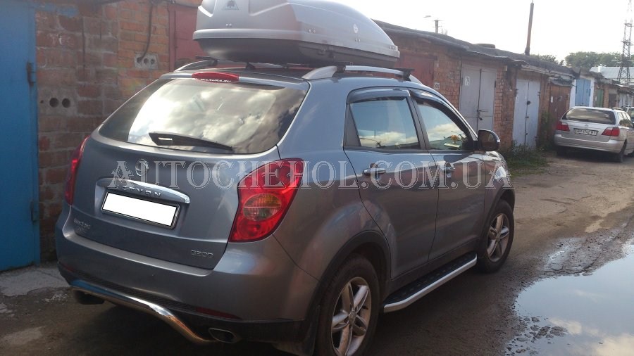 Защита заднего бампера на Ssang Yong Korando 2010, изогнутая, ST-Line